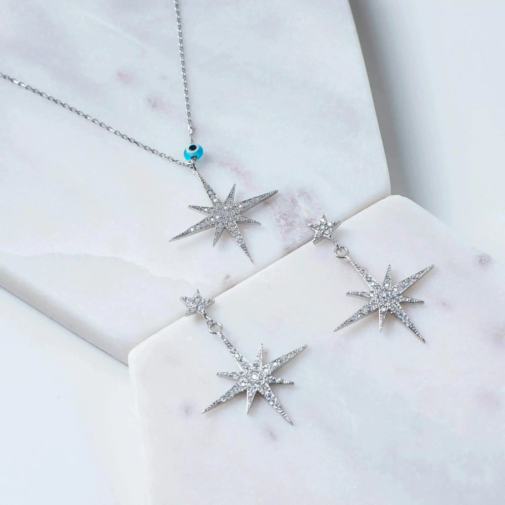 Petite Star Burst Drop Earrings | Silver Celestial Jewelry - Femstylo