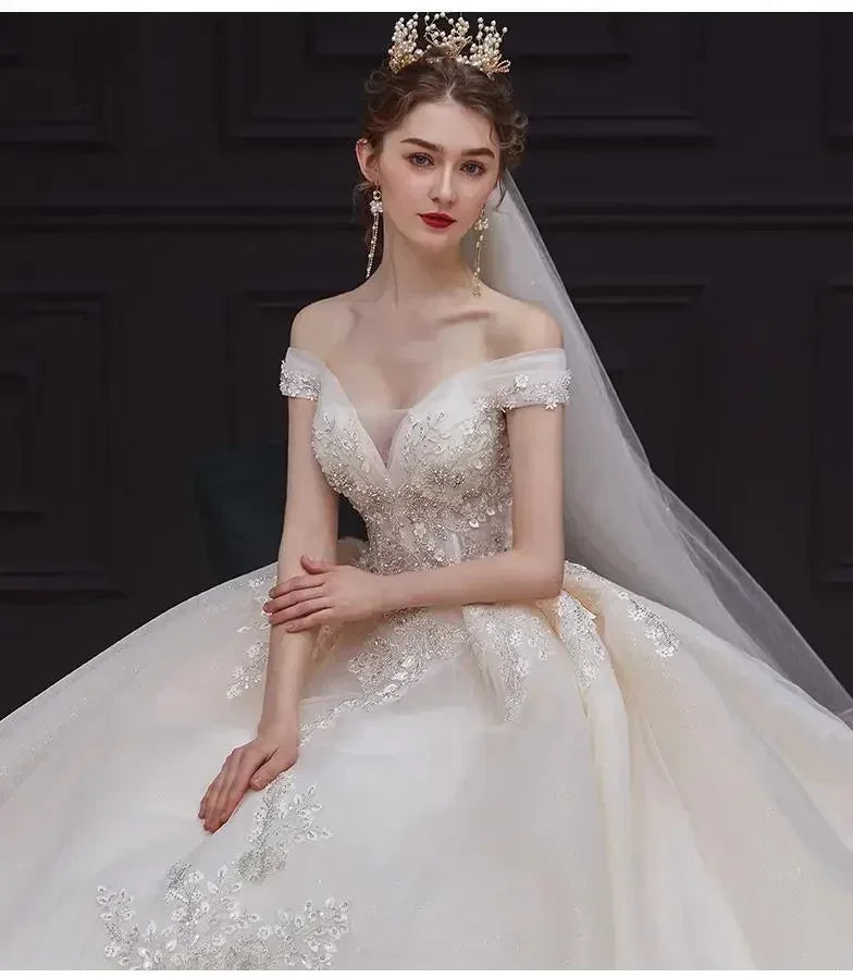 Luxury Off-Shoulder Wedding Dress - Handmade Lace Ball Gown | Femstylo