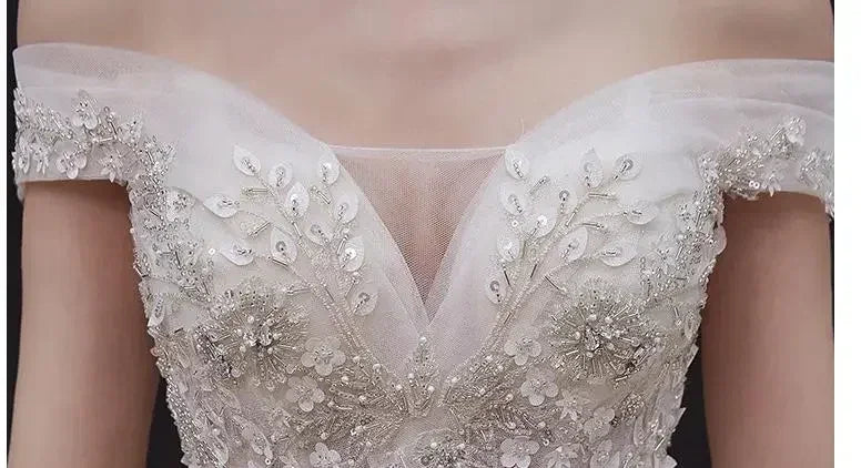Luxury Off-Shoulder Wedding Dress - Handmade Lace Ball Gown | Femstylo