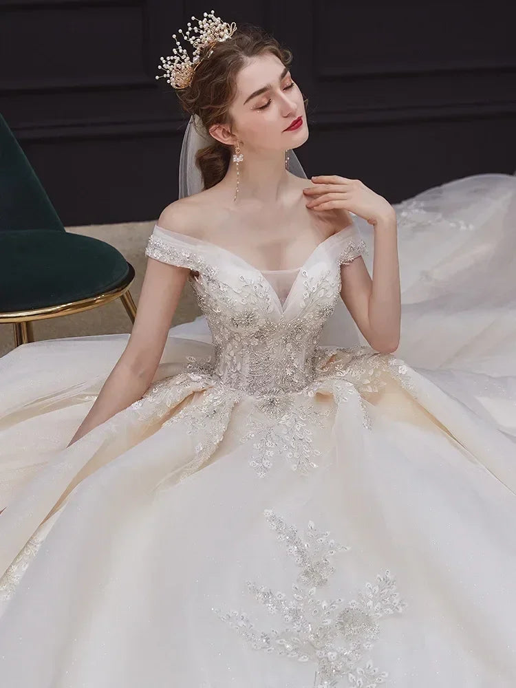 Luxury Off-Shoulder Wedding Dress - Handmade Lace Ball Gown | Femstylo