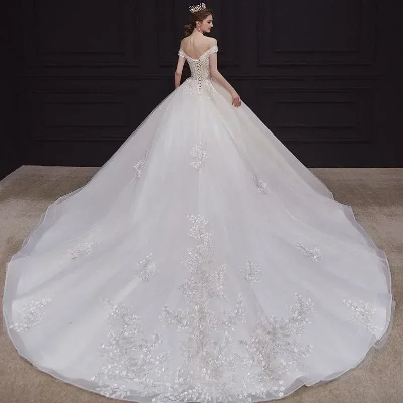 Luxury Off-Shoulder Wedding Dress - Handmade Lace Ball Gown | Femstylo